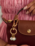 Passport Parade Keychain˘